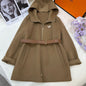 Prada hooded coat with a belt.