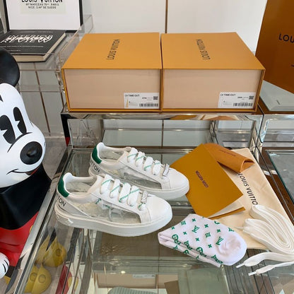 Louis Vuitton Time Out Sneaker with Green Monogram.