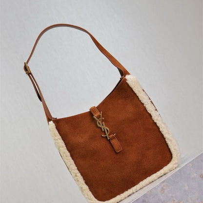 Saint Laurent Le 5 à 7 Small Shearling Shoulder Bag.