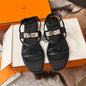 Hermès Empire Flat Sandals in noir (black) calfskin