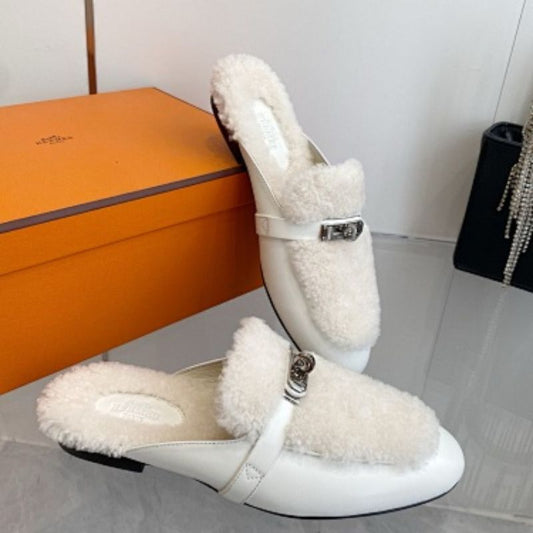 Hermès Carlotta Mules in a Blanc (white) leather and shearling variation