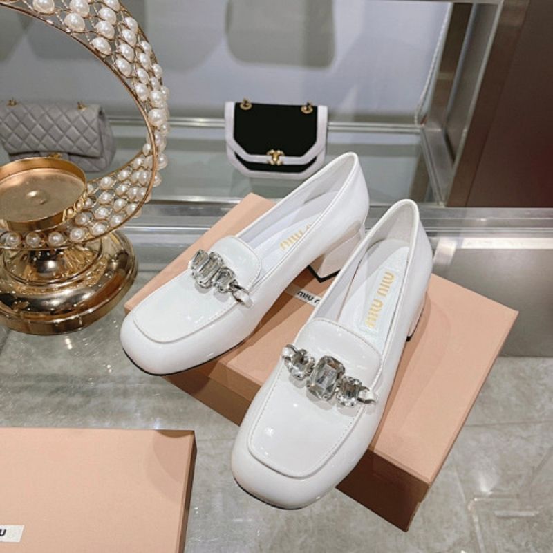 Miu Miu Embellished Patent Leather Pumps