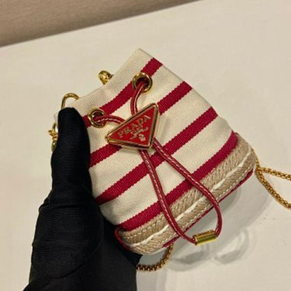 ada Crochet and Striped Canvas Bucket Bag.