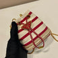 ada Crochet and Striped Canvas Bucket Bag.