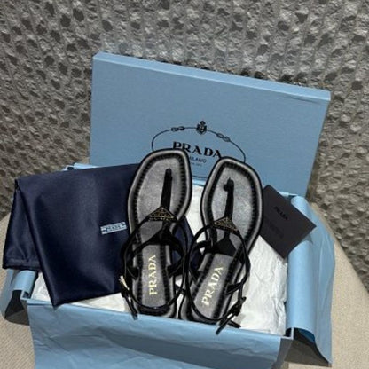 Prada Patent Leather T-Strap Enameled Triangle Logo Sandals.