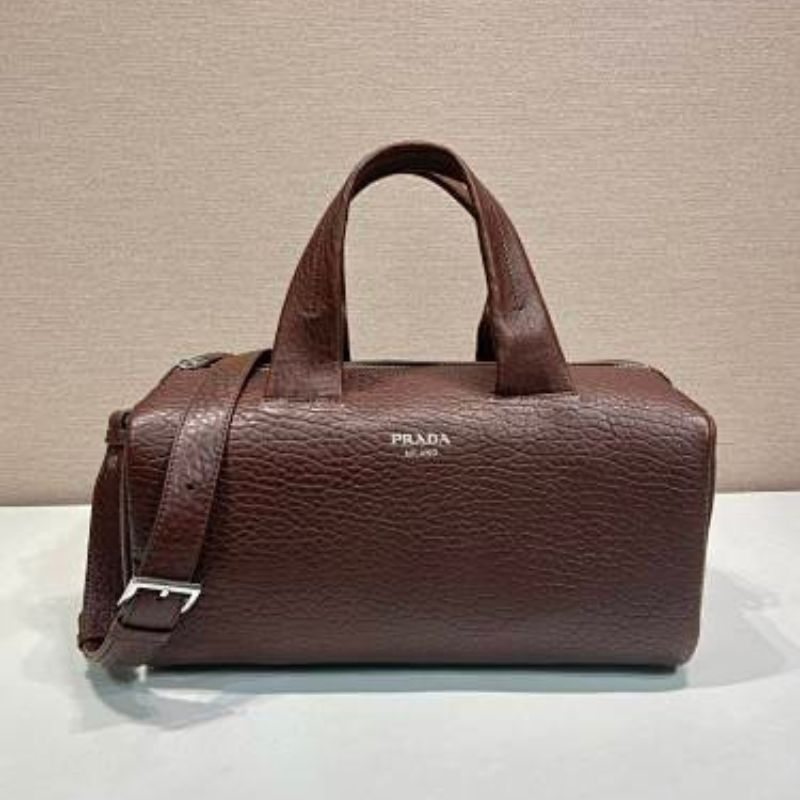 Prada Arqué Leather Tote Bag in a rich cocoa brown.
