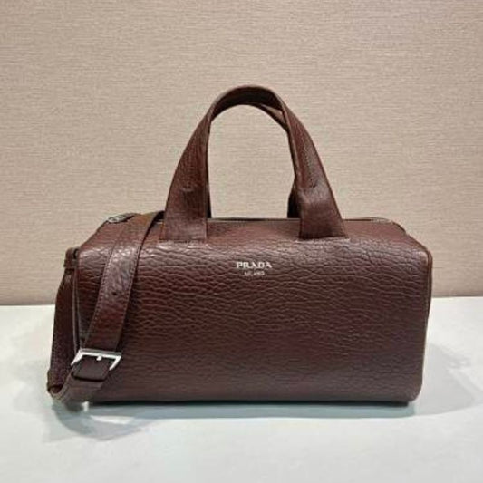 Prada Arqué Leather Tote Bag in a rich cocoa brown.