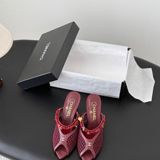 Chanel Coral Charm Mesh Open-Toe Mules in deep burgundy-red.
