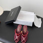 Chanel Coral Charm Mesh Open-Toe Mules in deep burgundy-red.
