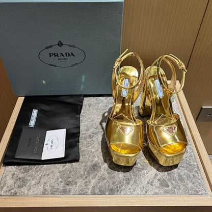 Prada Metallic Leather Platform Sandals in a luxurious liquid gold colorway.