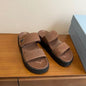 Prada Nubuck Flatform Slides in the cocoa brown ("Cacao")