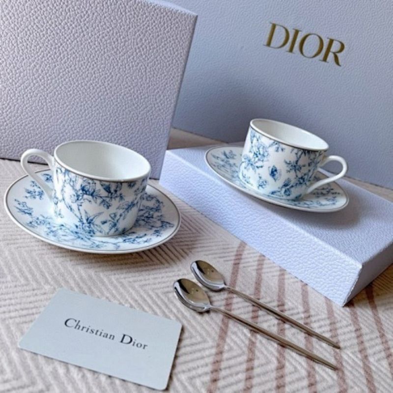 Dior Maison collection the iconic Toile de Jouy motif in blue and white.