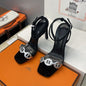 Hermès Ilot 85 Sandals in black suede and silver leather