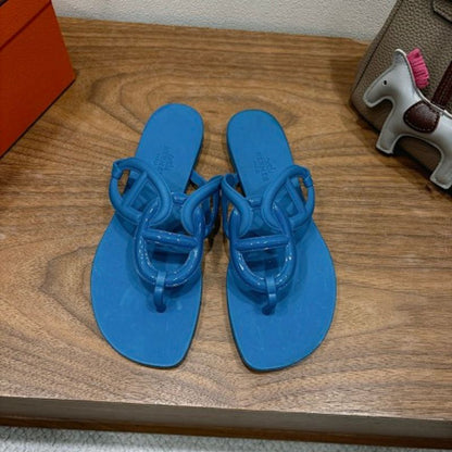 Hermès Égérie Sandals in a vibrant blue rubber