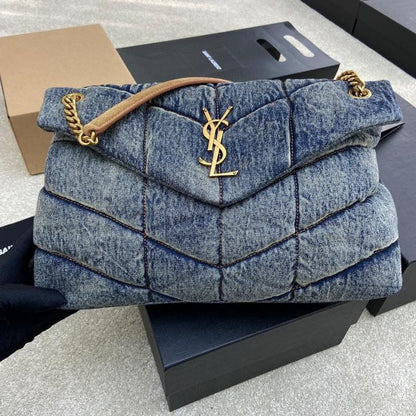 Saint Laurent Loulou Puffer bag in quilted denim.