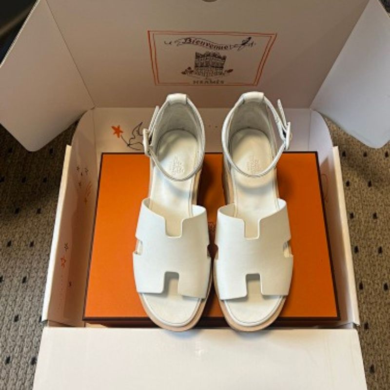 Hermès Eze Sandals in white calfskin.