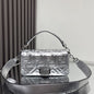 Fendi Baguette bag in a metallic silver finish.