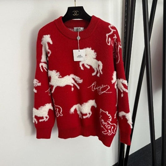 Hermès red knit sweater featuring a white horse motif