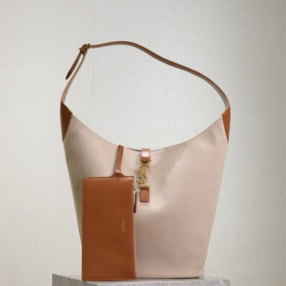Saint Laurent Le 5 à 7 supple large hobo bag in canvas and leather