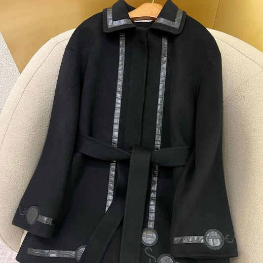 Herm*black wool-blend coat with distinctive faux leather
