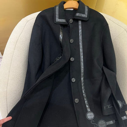 Herm*black wool-blend coat with distinctive faux leather