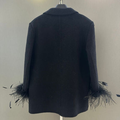 Chanel Black double-breasted blazer with feather cuffs