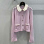 Chanel-style pink knitted cardigan with a white Peter Pan collar
