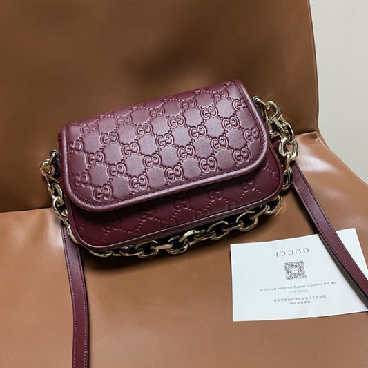 Gucci GG embossed leather Small Shoulder Bag