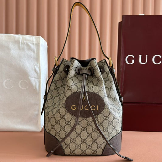 Gucci Neo Vintage GG Supreme Drawstring Bucket Backpack.