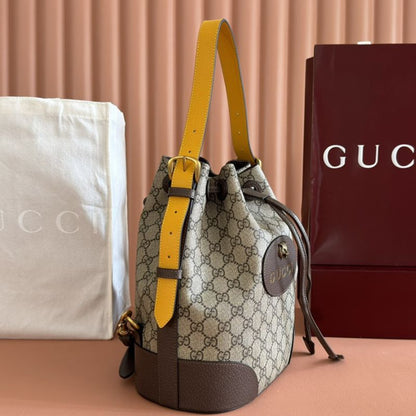 Gucci Neo Vintage GG Supreme Drawstring Bucket Backpack.