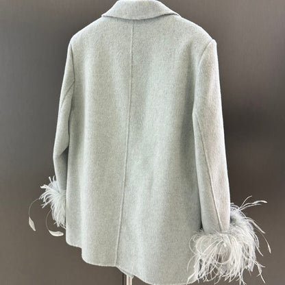 Chanel double-breasted blazer with feather cuffs