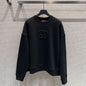 Gucci Black crewneck sweatshirt with an embossed interlocking G logo