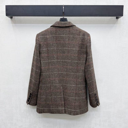 Miu Miu brown tweed blazer.
