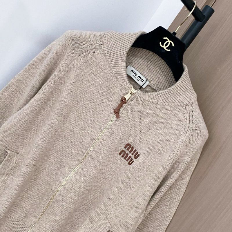 Miu Miu beige knit zip cardigan.