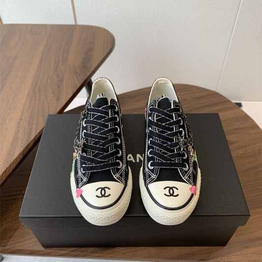 Chanel black canvas low-top sneakers