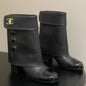 Chanel boots with a fold-over cuff and buttons