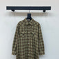 Miu Miu brown plaid shirt.