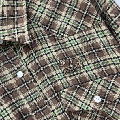 Miu Miu brown plaid shirt.