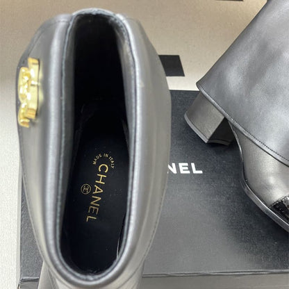 Chanel boots with a fold-over cuff and buttons