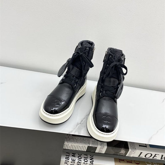 Chanel platform lace-up boots