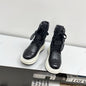 Chanel platform lace-up boots