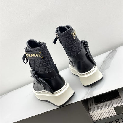 Chanel platform lace-up boots