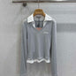 Miu Miu long-sleeve sweater or knit top.