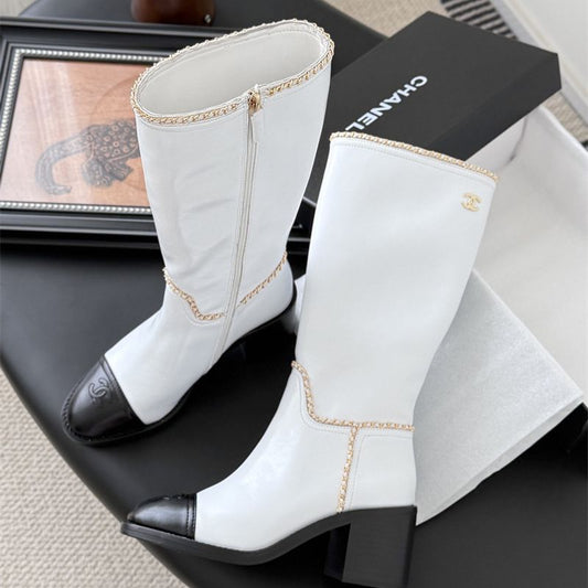 Chanel mid-calf boots.
