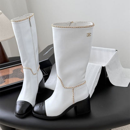 Chanel mid-calf boots.