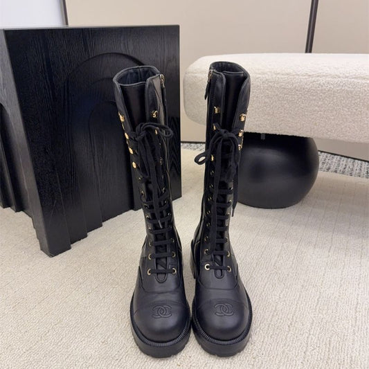 Chanel lace-up combat boots