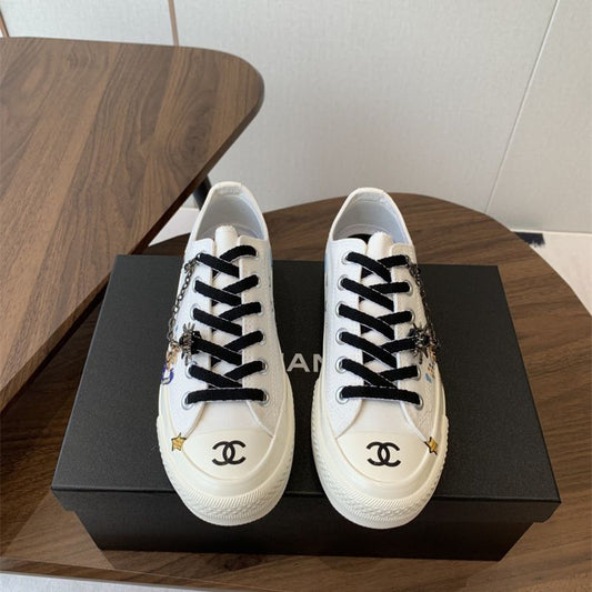 Chanel white low-top canvas sneakers
