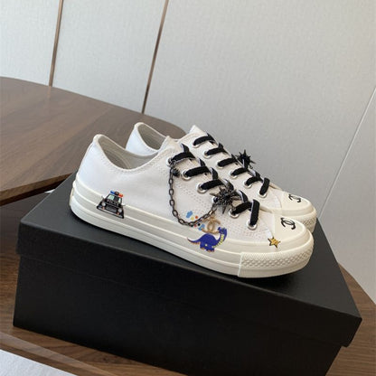 Chanel white low-top canvas sneakers