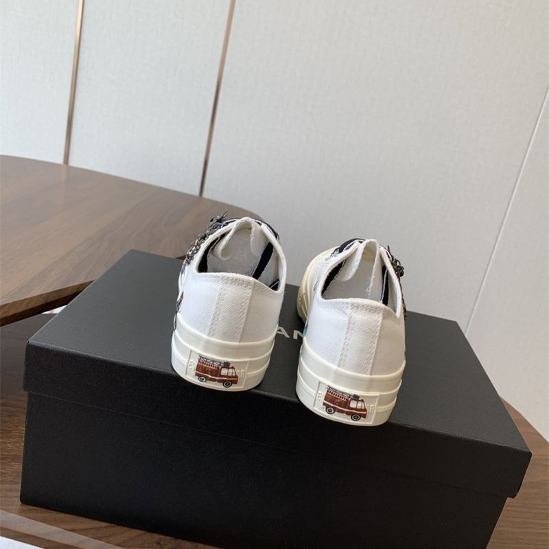 Chanel white low-top canvas sneakers