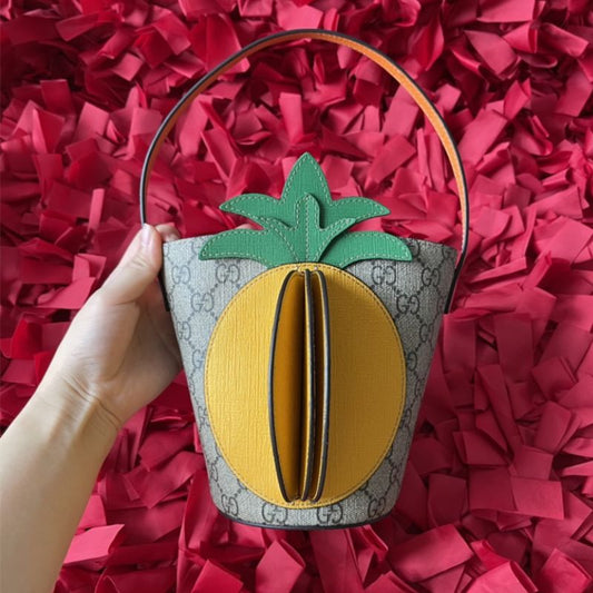 Gucci GG Supreme Children's bucket bag with pineapple